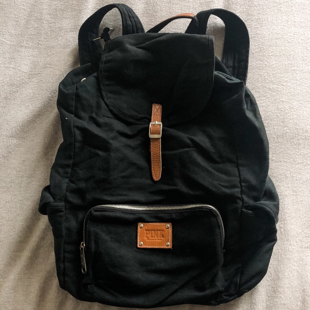 PINK. black backpack